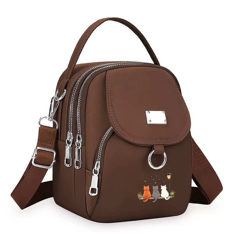 A Women'S Shoulder Bag Featuring a Cute Cat Design, Known As a Lucky Cat Bag, Believed to Bring Fortune to Its Owner, Made from High-Quality Nylon And Fabric