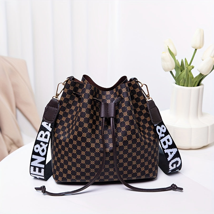 A Stylish Bucket Bag with Random Prints, Featuring a Large Capacity, Drawstring Closure, And Perfect for Commuting, Ideal for a Trendy Shoulder Or Crossbody Look