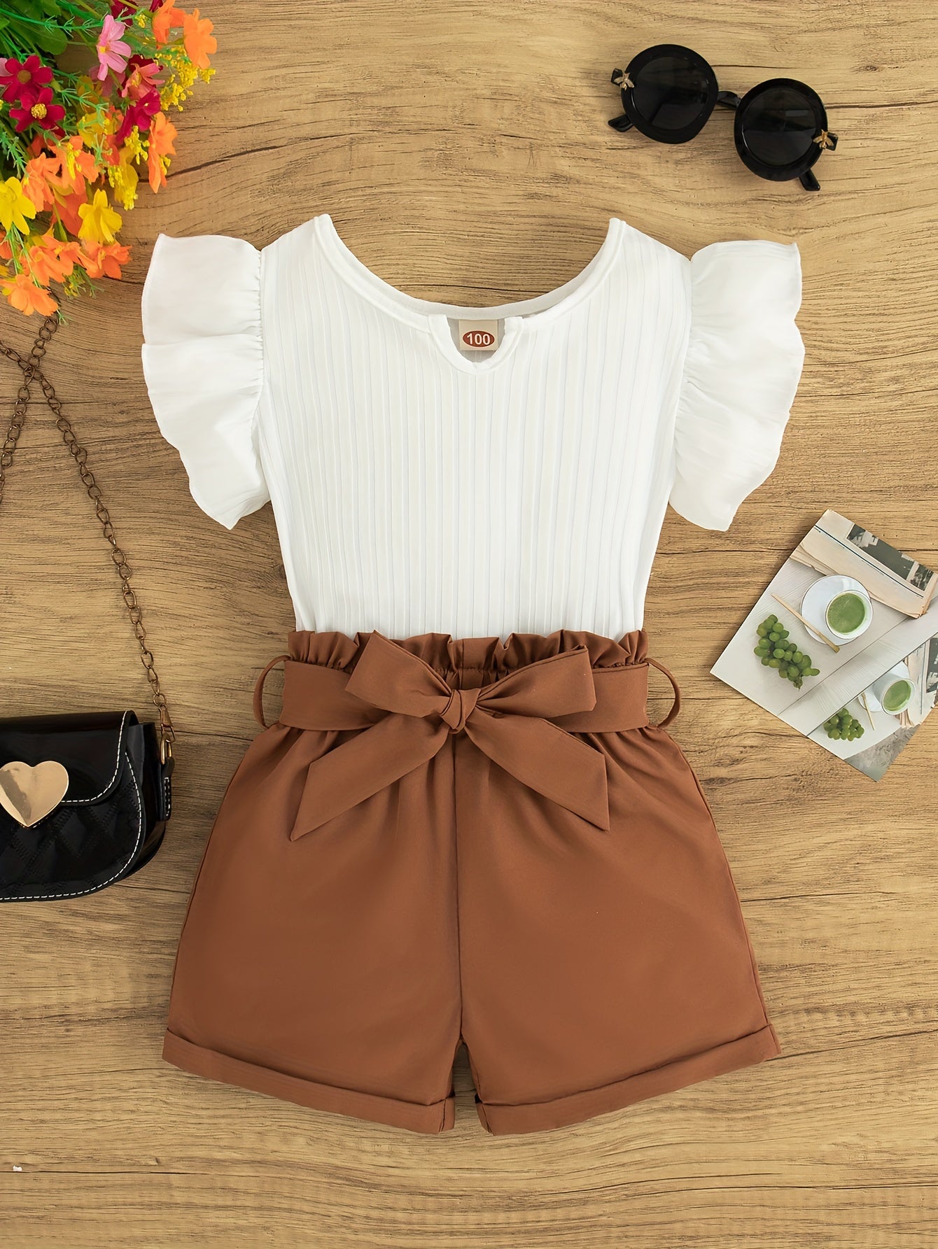 A Summer Casual Outfit for Girls Featuring a Sleeveless Round-Neck Top And Shorts Set, Complete with a Belt, for Outdoor