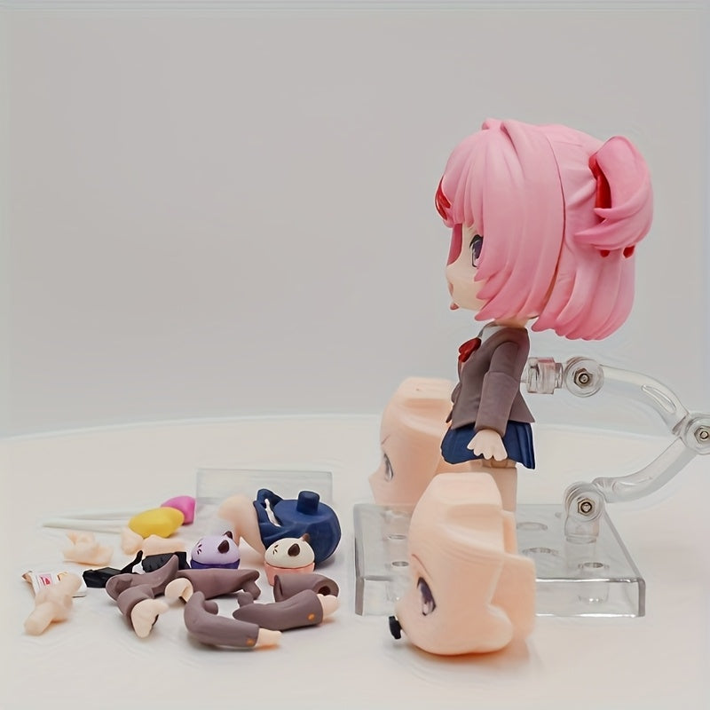 A Charming Anime Girl Statue with Interchangeable Faces - a PVC Collectible, Perfect for Decorating And Desks, an Ideal Gift for Anime Enthusiasts