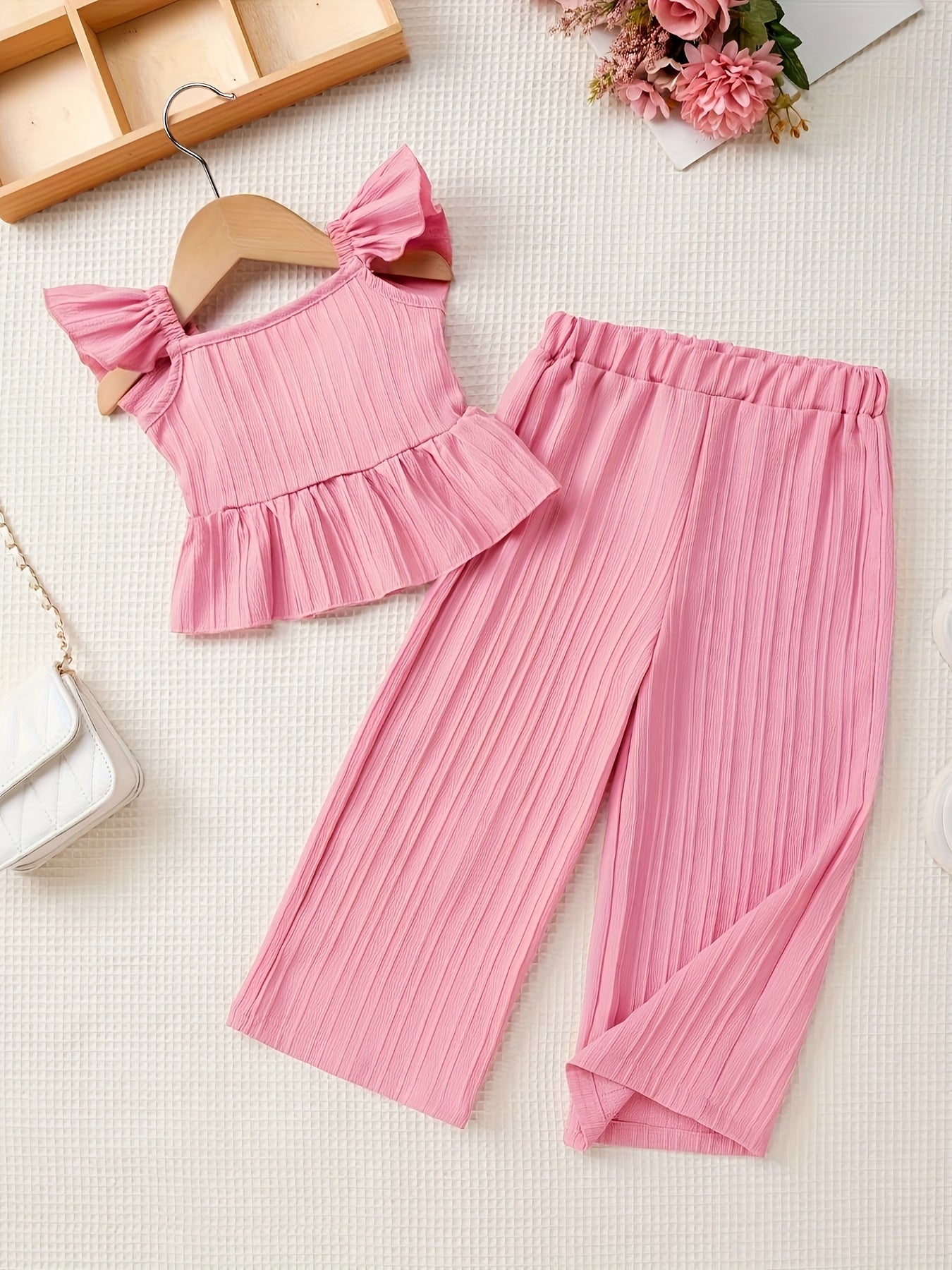 This Is a Stylish And Casual Two-Piece Set for Girls, Featuring a Sleeveless Top with a Butterfly Knot at The Back And Wide-Leg Pants, Perfect for Summer, for Outdoor