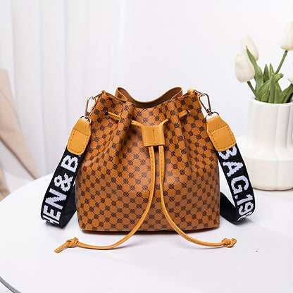 A Stylish Bucket Bag with Random Prints, Featuring a Large Capacity, Drawstring Closure, And Perfect for Commuting, Ideal for a Trendy Shoulder Or Crossbody Look