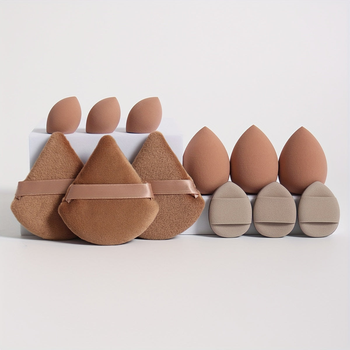 This 12pcs All-In-One Makeup Sponge Set Includes 3 Loose Powder Puffs, 3 Mini Cushion Sponges, 3 Makeup Sponges, And 3 Mini Makeup Sponges. These Sponges Are Perfect for Blending Liquids, Creams, And Powders. Latex-Free, Wet And Dry Use