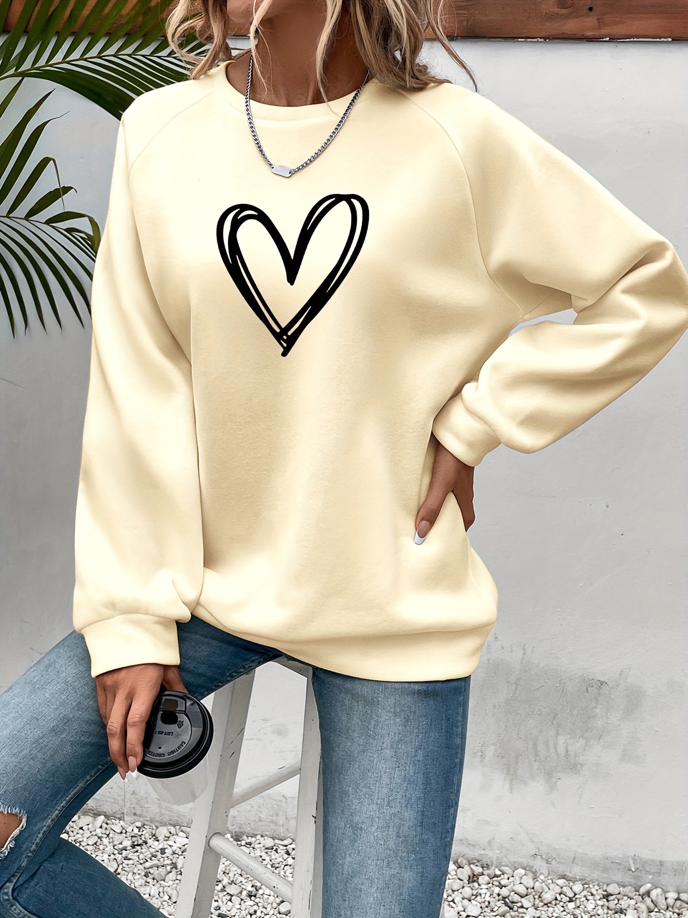 Cozy Fleece-Lined Women's Heart Print Sweatshirt - Casual Long Sleeve Crew Neck Pullover, Perfect for Fall & Winter, Machine Washable, Grey with Black Heart Design