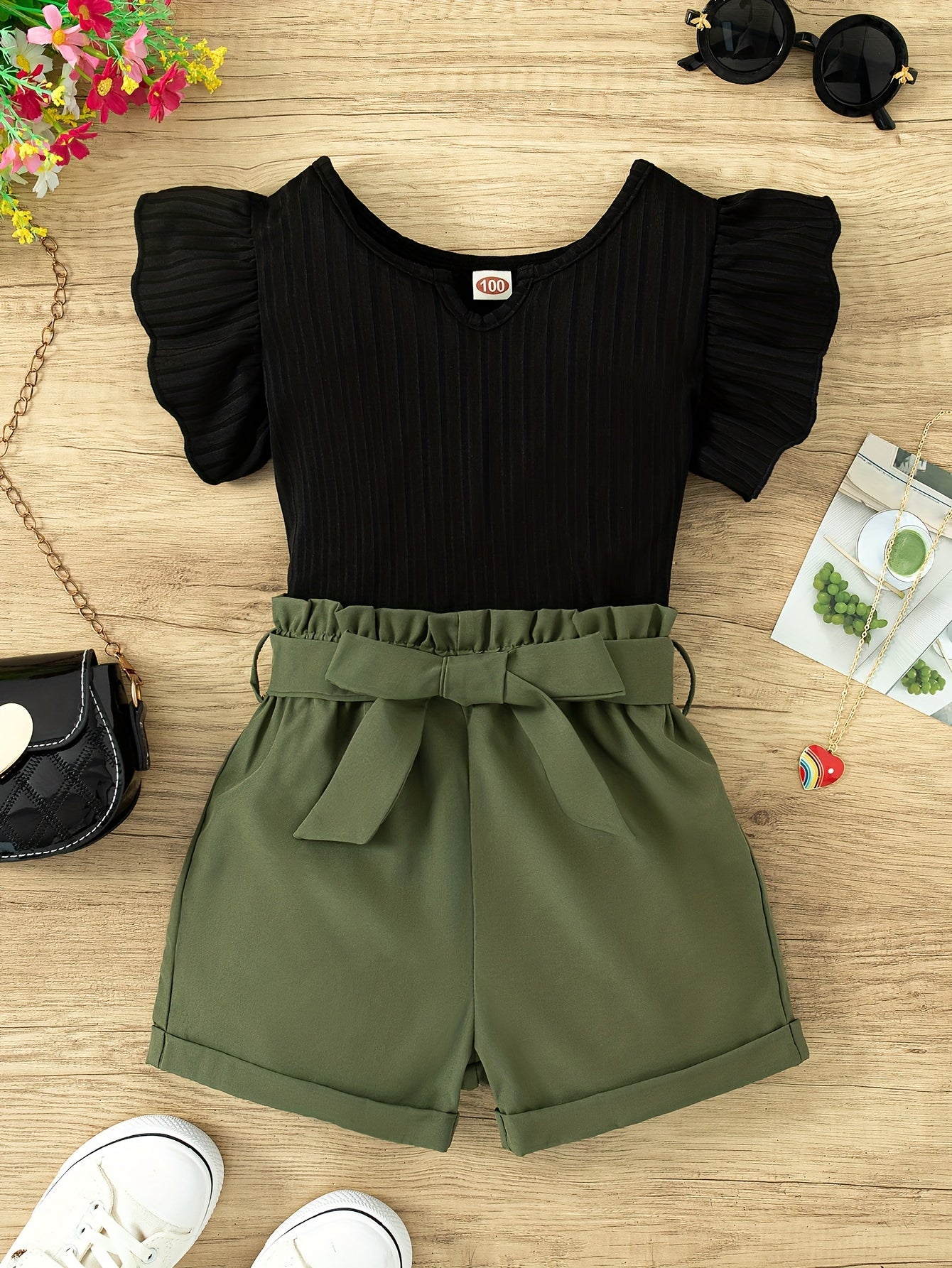 A Summer Casual Outfit for Girls Featuring a Sleeveless Round-Neck Top And Shorts Set, Complete with a Belt, for Outdoor