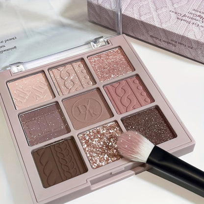 A 9-Color Eyeshadow Palette Featuring Low-Saturation Matte And Shimmer Velvet Textures in Earthy Tones, Taro, Milk Tea, And Powdery Purple Shades That Are Waterproof And Long-Lasting Without Smudging
