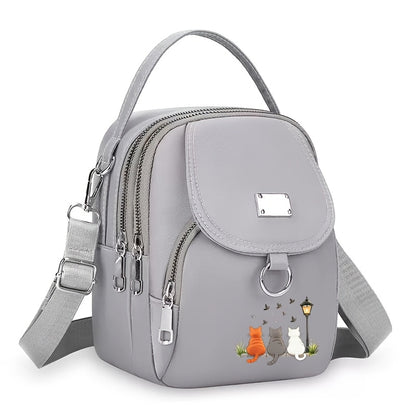 A Women'S Shoulder Bag Featuring a Cute Cat Design, Known As a Lucky Cat Bag, Believed to Bring Fortune to Its Owner, Made from High-Quality Nylon And Fabric