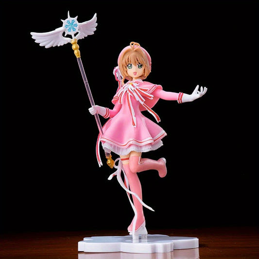 A Pink Magical Girl Anime Figurine, a Dreamlike Representation of Sakura Kinomoto, a Standing Model Toy for Desktop Decoration, a Collectible Action Figure Gift