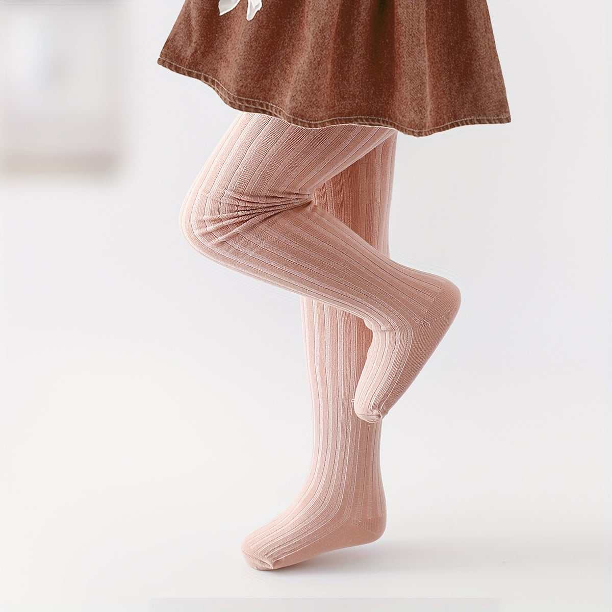 A Pair of Girls' Spring And Autumn Leggings for Infants And Children, Featuring Solid Color Ribbed Striped Tights, Knitted Leggings That Go Well with Dresses, Stylish And Versatile