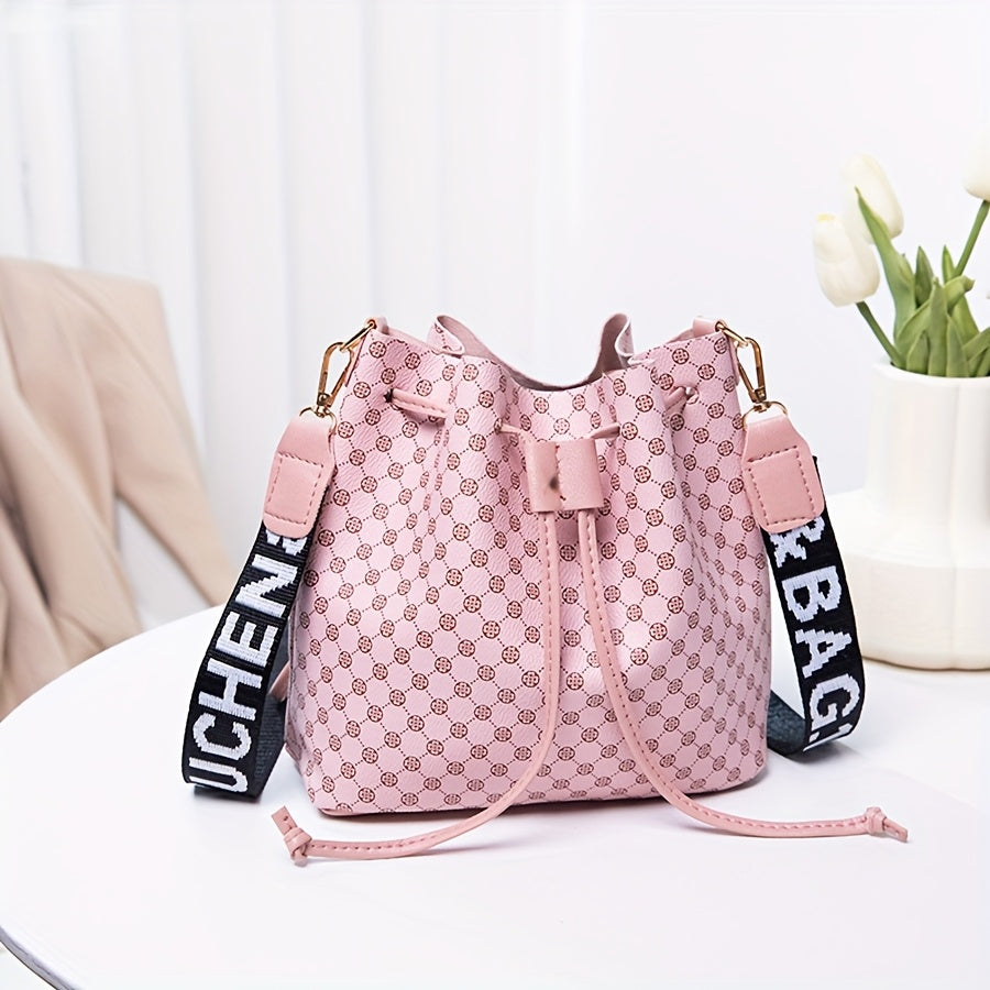 A Stylish Bucket Bag with Random Prints, Featuring a Large Capacity, Drawstring Closure, And Perfect for Commuting, Ideal for a Trendy Shoulder Or Crossbody Look