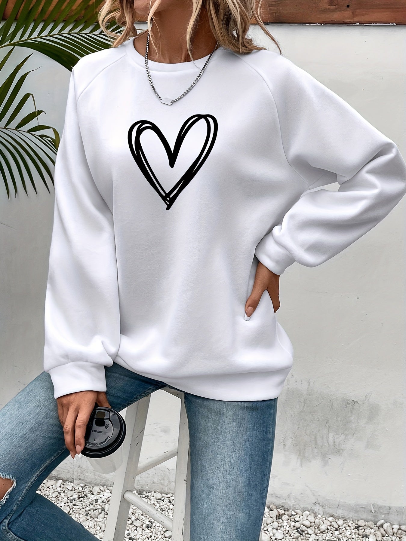 Cozy Fleece-Lined Women's Heart Print Sweatshirt - Casual Long Sleeve Crew Neck Pullover, Perfect for Fall & Winter, Machine Washable, Grey with Black Heart Design