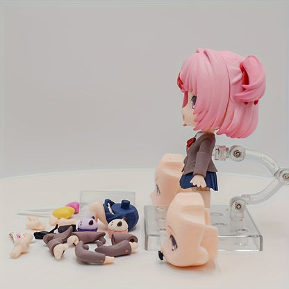 A Charming Anime Girl Statue with Interchangeable Faces - a PVC Collectible, Perfect for Decorating And Desks, an Ideal Gift for Anime Enthusiasts