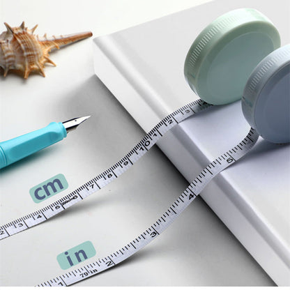 A Plastic Measuring Tape, 59.06 Inches Long, a Cute Soft Tape Measure, Featuring Automatic Retractable Design