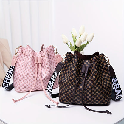 A Stylish Bucket Bag with Random Prints, Featuring a Large Capacity, Drawstring Closure, And Perfect for Commuting, Ideal for a Trendy Shoulder Or Crossbody Look