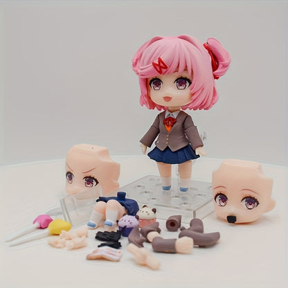 A Charming Anime Girl Statue with Interchangeable Faces - a PVC Collectible, Perfect for Decorating And Desks, an Ideal Gift for Anime Enthusiasts