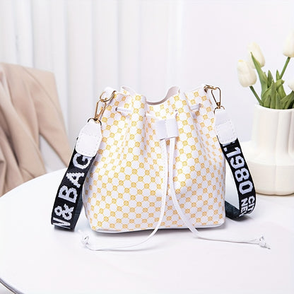 A Stylish Bucket Bag with Random Prints, Featuring a Large Capacity, Drawstring Closure, And Perfect for Commuting, Ideal for a Trendy Shoulder Or Crossbody Look