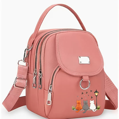 A Women'S Shoulder Bag Featuring a Cute Cat Design, Known As a Lucky Cat Bag, Believed to Bring Fortune to Its Owner, Made from High-Quality Nylon And Fabric